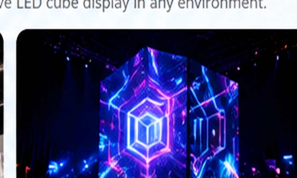 Moon-themed cube-shaped LED display in a museum-style atrium